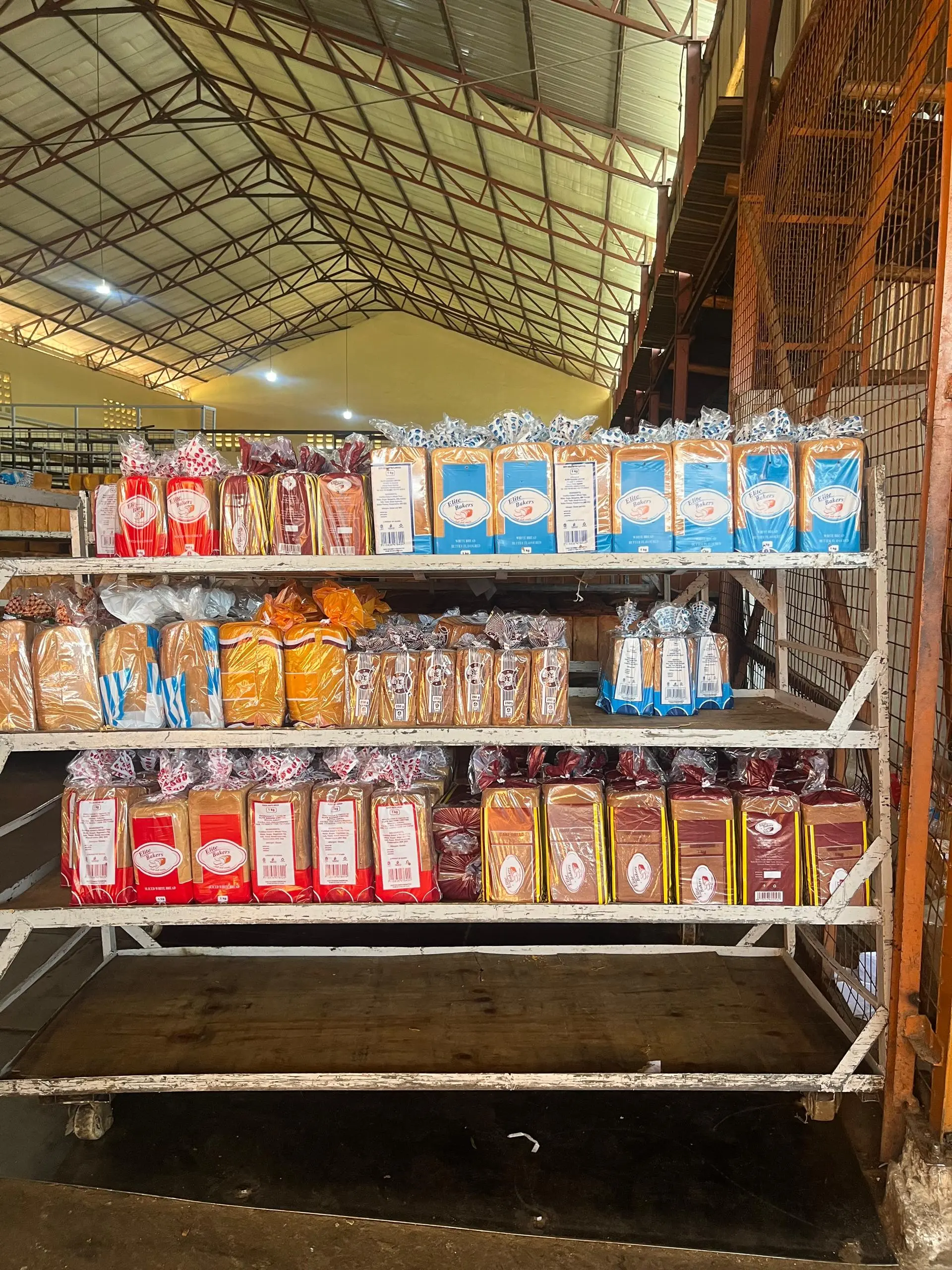 Peace Natukunda - Executive Pastry Chef at Elite Bakers Uganda specializing in Custom cakes, sugar florals